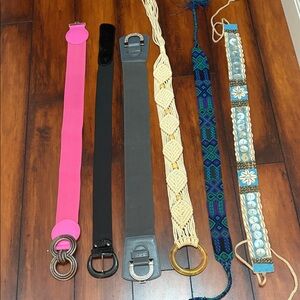 Six variety of belts. Size M/L.  Three stretch belts and three tie belts.
